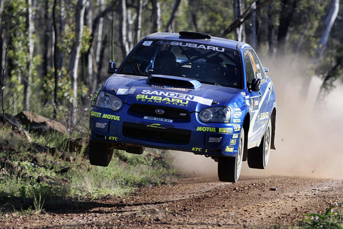 Subaru PWRC driver Toshi Arai in action on SS8 during leg one, Telstra Rally Australia 2005.