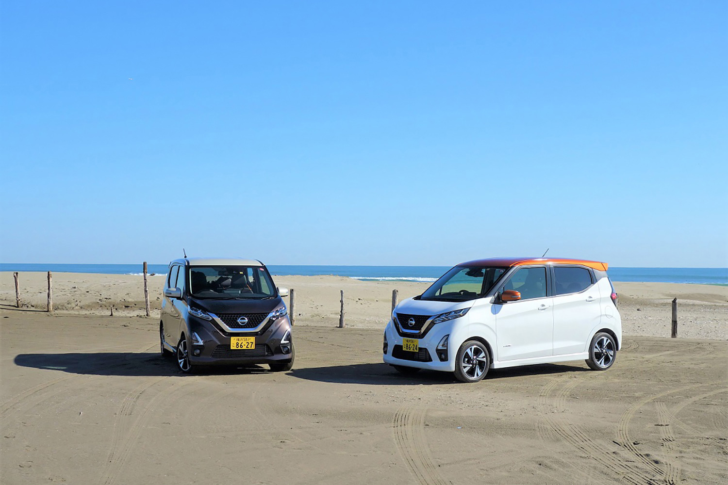 砂浜に駐車するクルマのイメージ