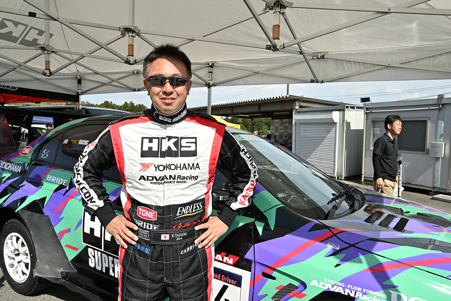 HKSランサーエボリューションとドライバーの田口勝彦氏