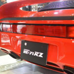 ブリヂストンのブースで鬼目立ちだったのは真紅のポルシェ959！　名だたるスーパーカーメーカーに認められた初代「RE71」伝説とは【東京オートサロン2026】